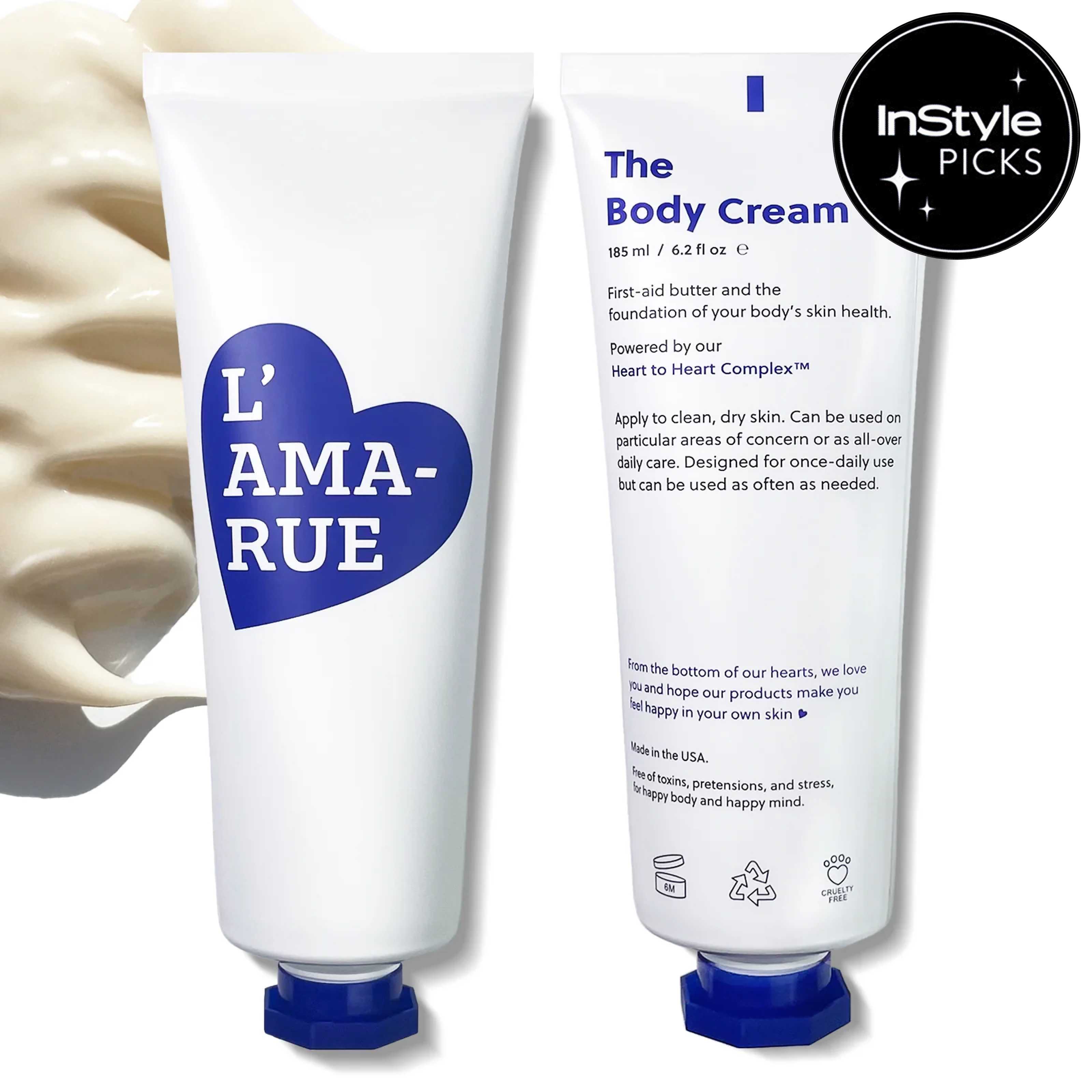 Two tubes of L'AMA-RUE cream with visible cream smeared beside them.