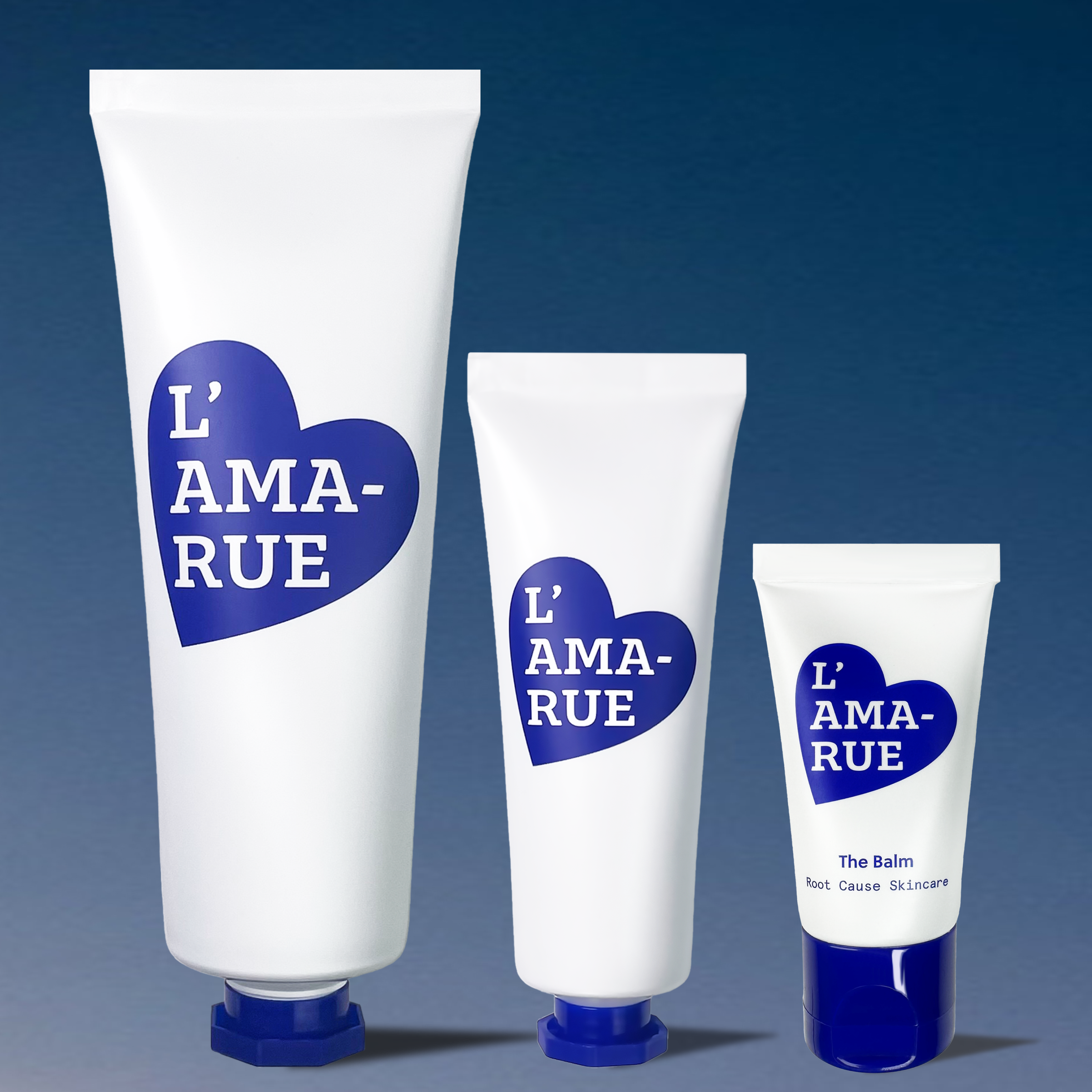Two tubes of L'AMA-RUE cream with visible cream smeared beside them.