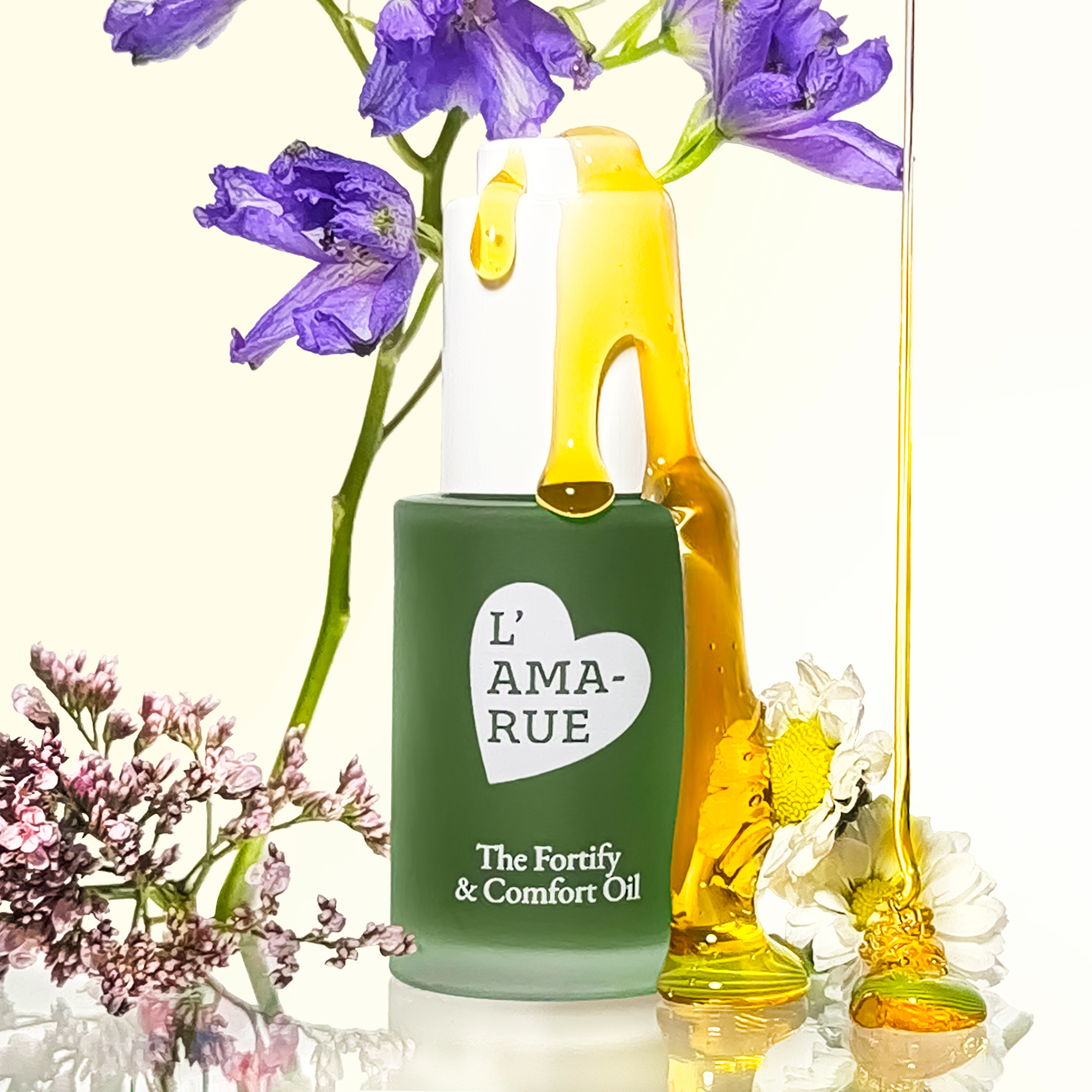 Blue toner bottle labeled 'L'AMARUE' with fig and plant illustrations.